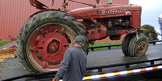 Tractor on a flatbed. Tractor on a flatbed.
